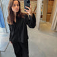 Celine is 168 cm tall and wears size M. 
