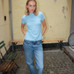 Ulrikka is 176 cm tall and wears size XS women fit | women light blue