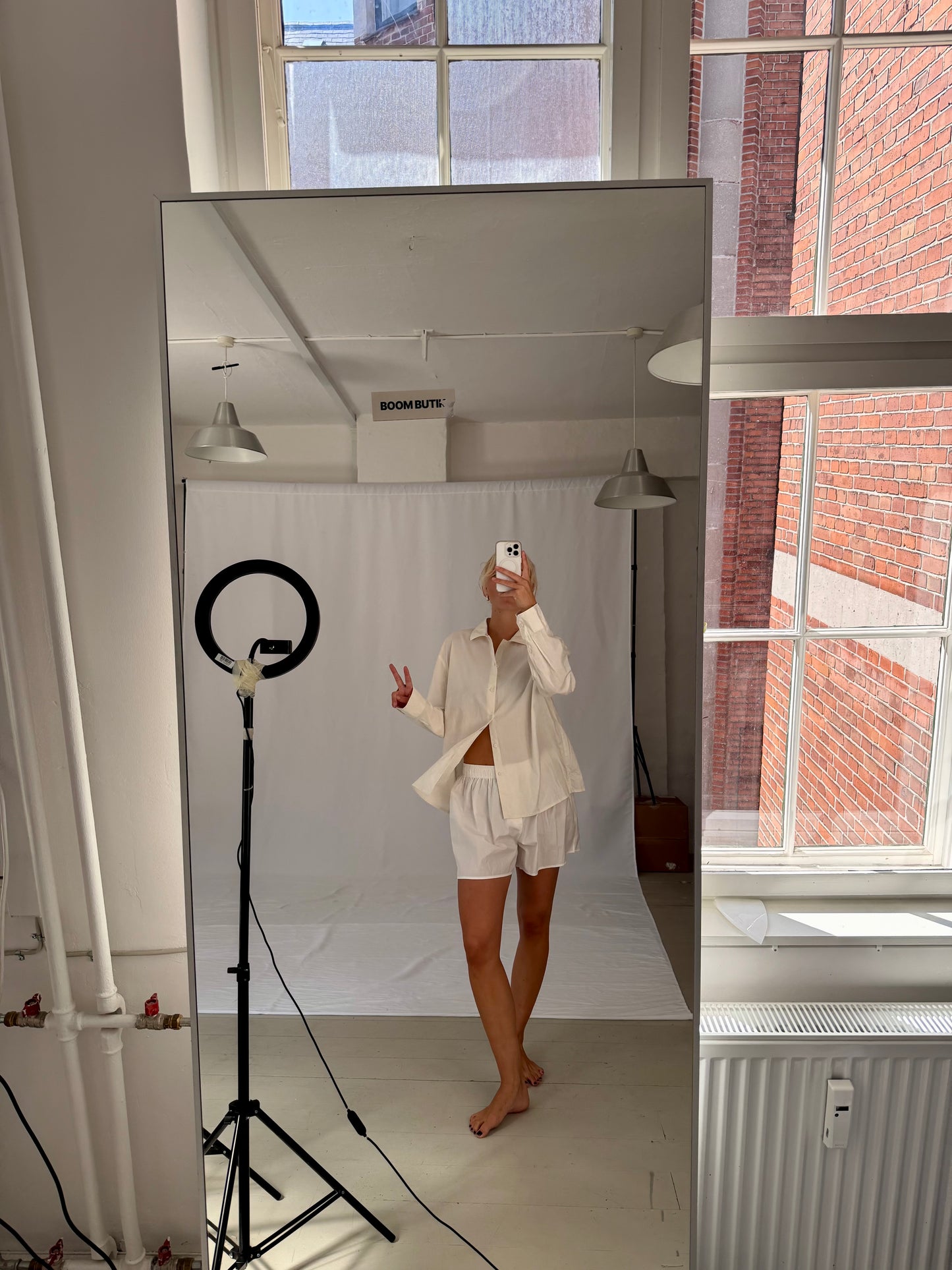 Sofie is 170 cm tall and wears size M. | white
