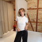 Freja is 168 cm tall and wears size XS. | white